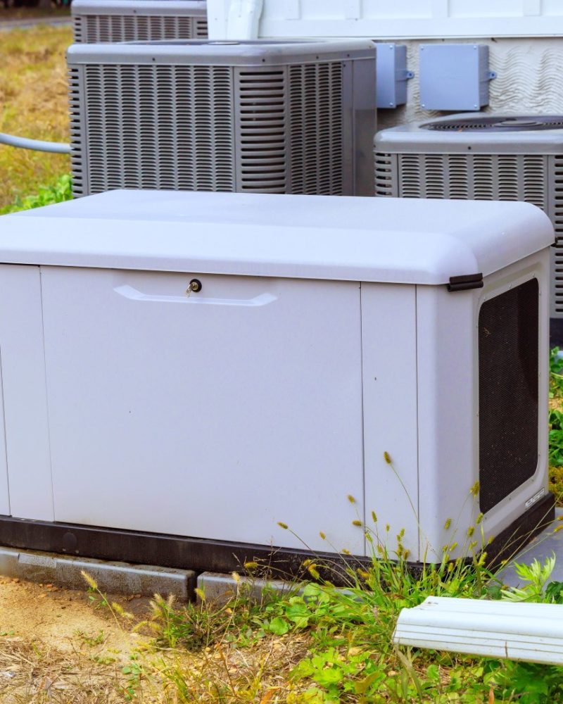 generator-and-air-conditioners-outside-a-suburban-2026-03-25-00-00-59-utc (Large)